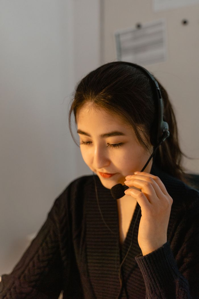 Crafting Captivating Headlines: Your awesome post title goes here Professional call center operator providing customer service assistance.